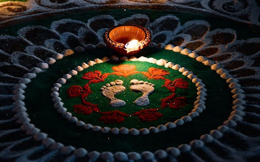 Diya on rangoli